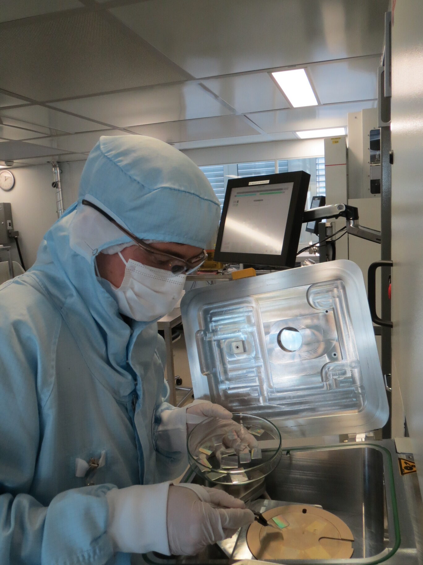 A team member working in the cleanroom